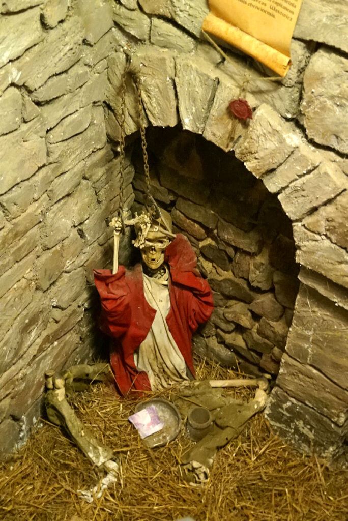 Skazaniec w lochu baszty zachodniej